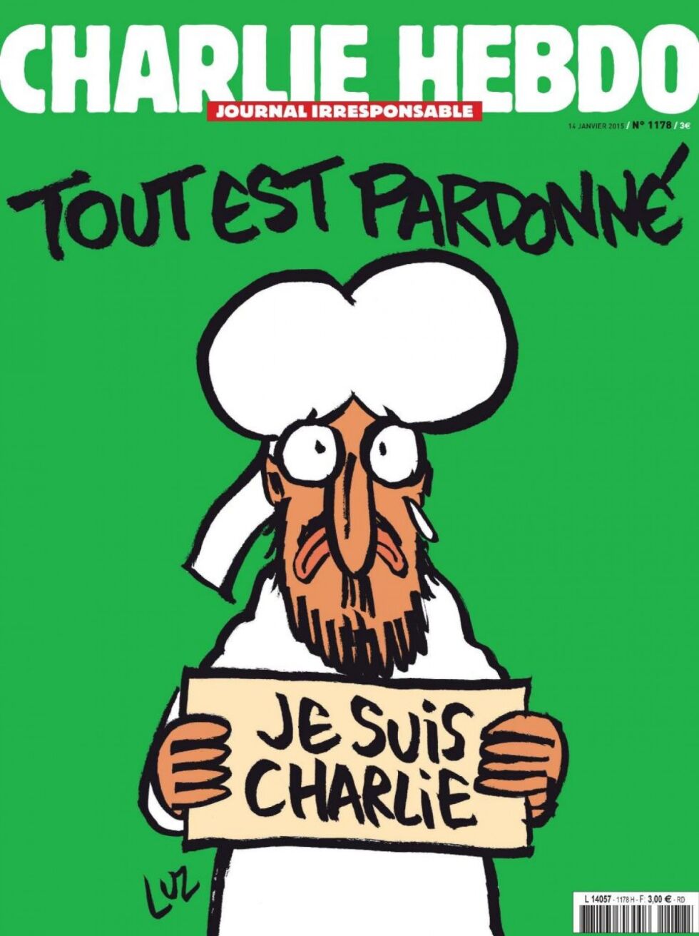 Den første utgaven av satiremagasinet Charlie Hebdo etter terrorangrepet viste en tegning av profeten Muhammed(?) som holder en plakat med «Je suis Charlie» og overskriften «Alt er tilgitt».
 Foto: Charlie Hebdo